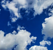 Fluffy clouds in a blue sky