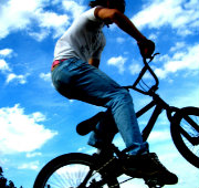 A man riding a BMX bike